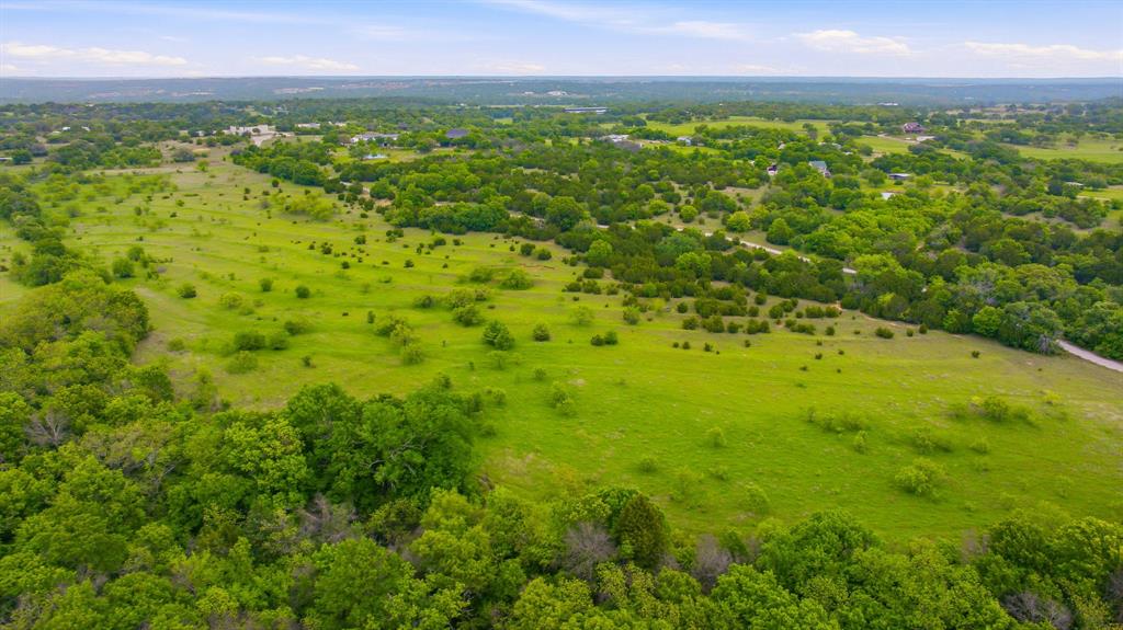 4823 Airport Road Aledo, TX 76008 - Photo 30 of 39 a view of a green field with lots of bushes