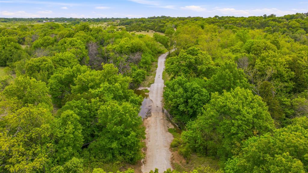 4823 Airport Road Aledo, TX 76008 - Photo 34 of 39 a view of a yard with an ocean