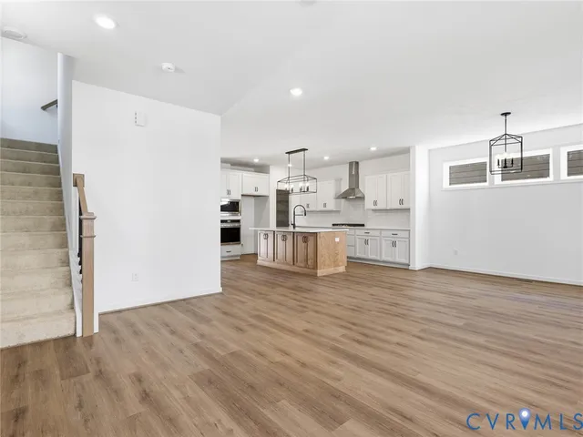 a view of kitchen with wooden floor
