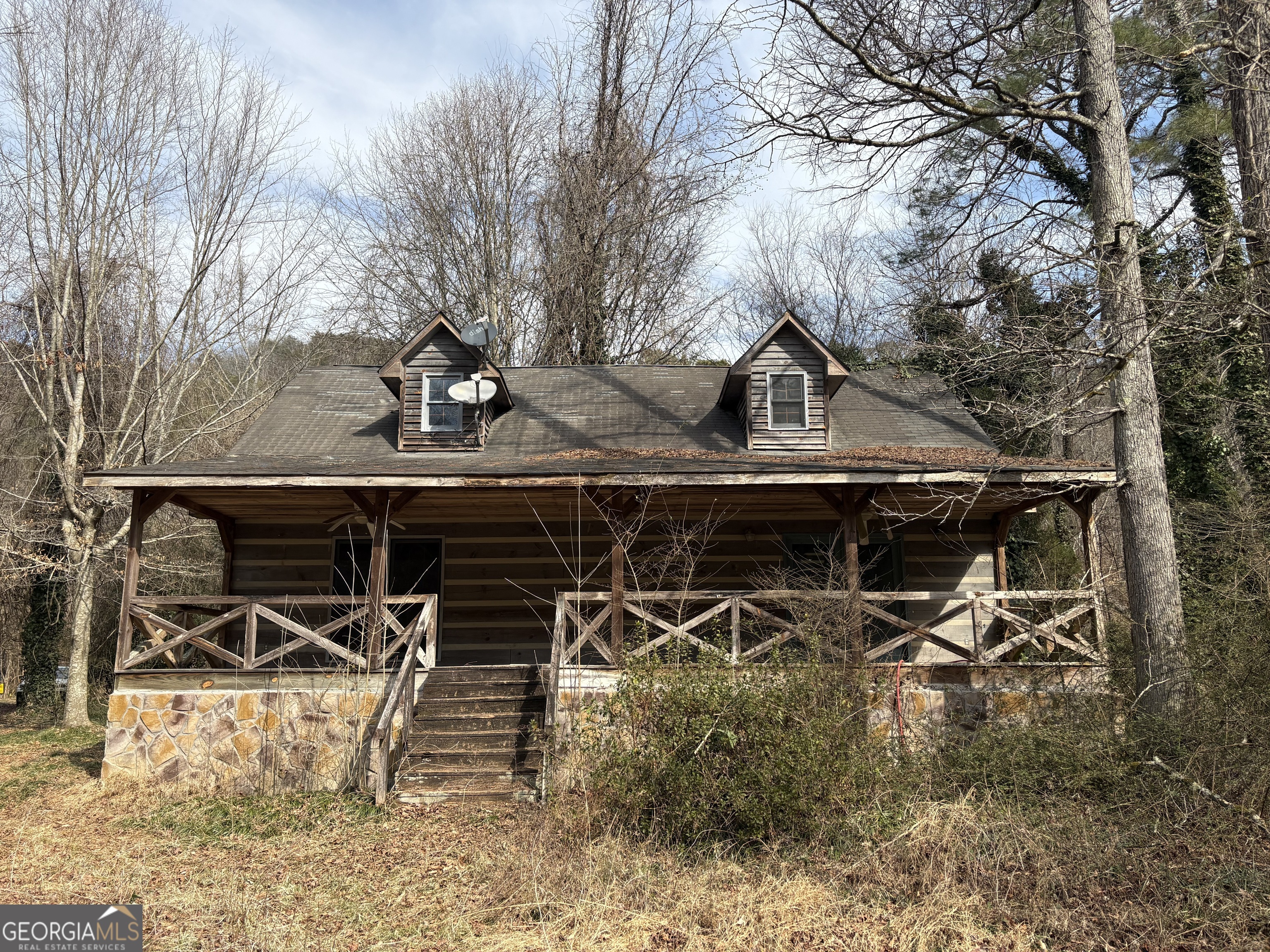 a view of a chairs and table on the terrace