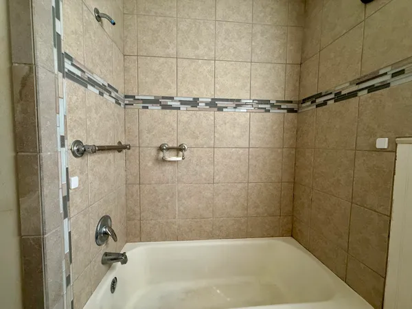 a bathroom with a bathtub