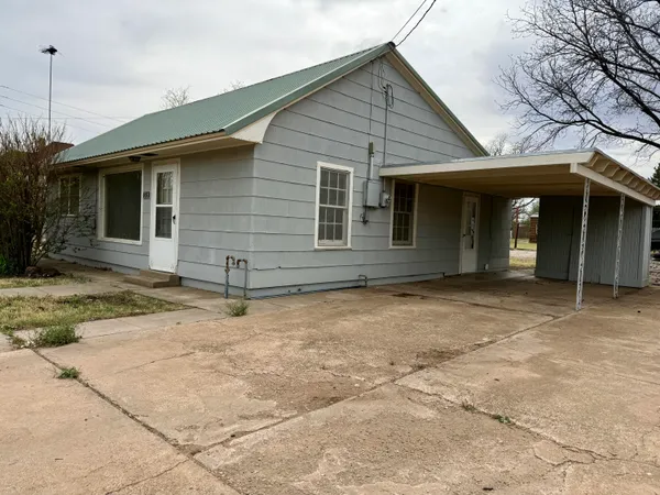 a front view of a house with garage