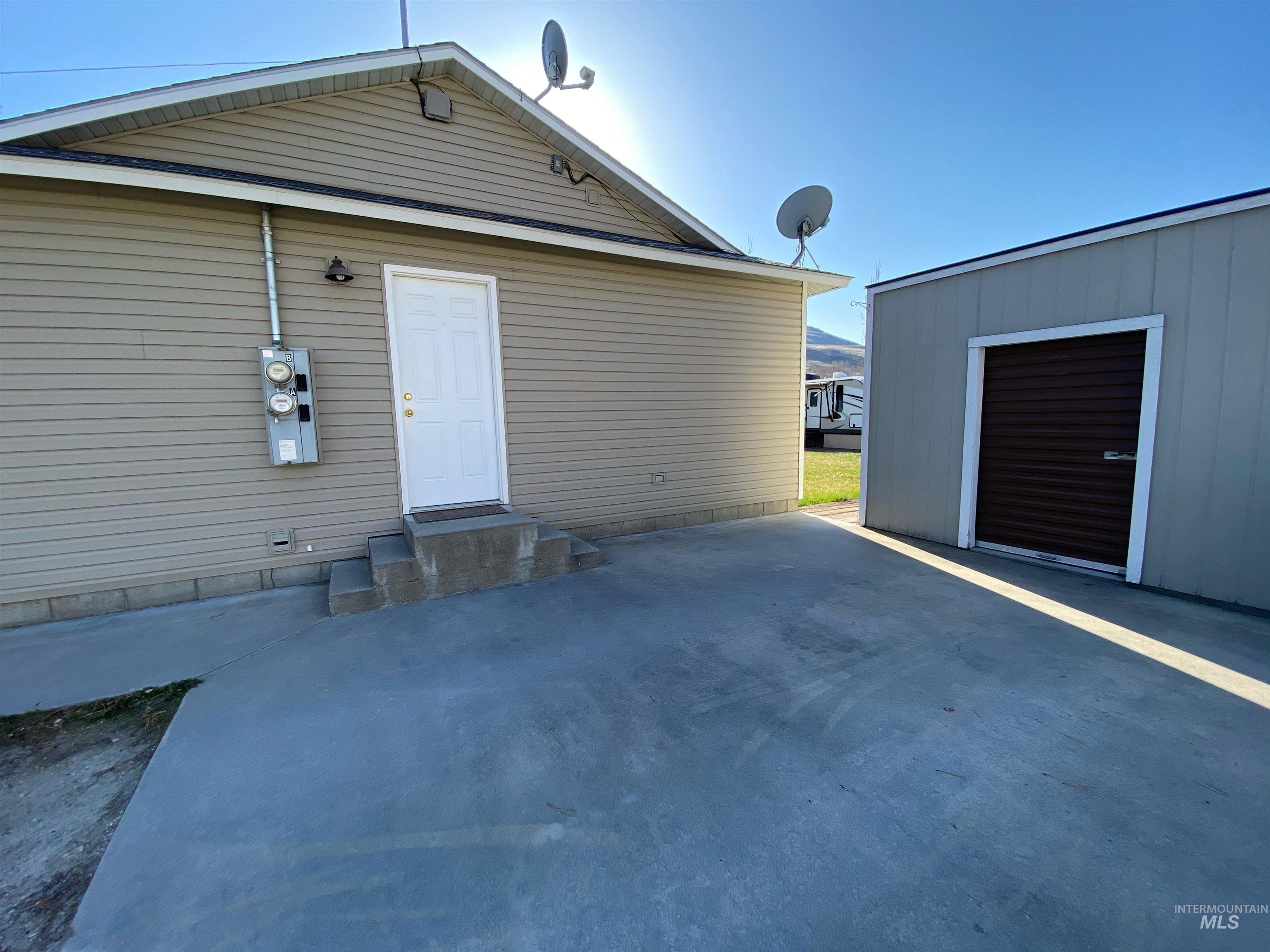 109 Adams Street Horseshoe Bend, ID 83629 - Photo 8 of 13 Driveway of duplex + shed