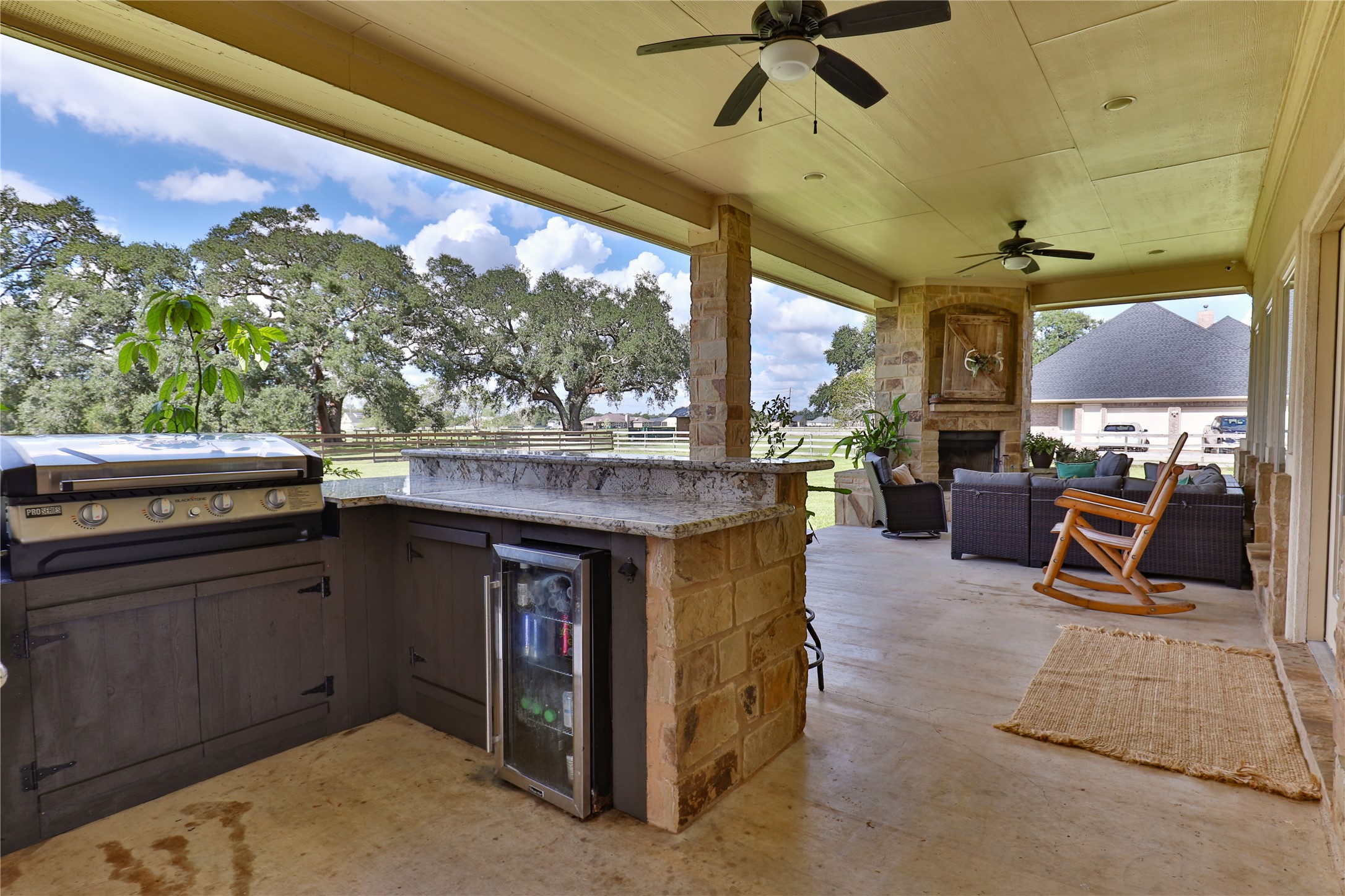 814 Comanche Trail Drive Rosharon, TX 77583 - Photo 39 of 50 a outdoor space with chairs