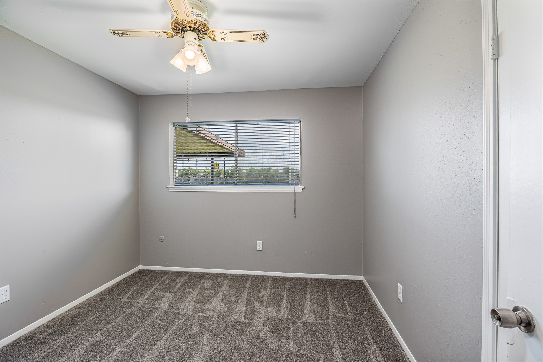 206 Kelly Lane Baytown, TX 77521 - Photo 24 of 38 Bedroom 2 has fresh paint and new carpet.