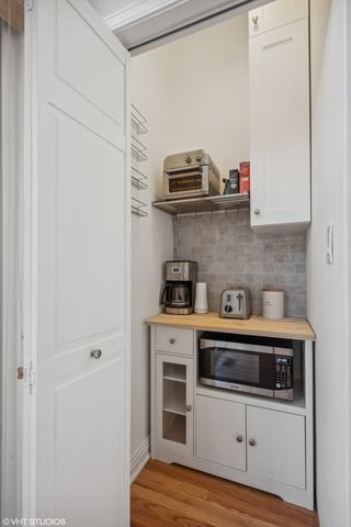 a kitchen with stainless steel appliances a stove and a refrigerator