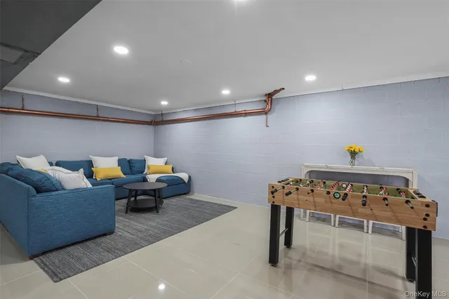 a living room with furniture and a table