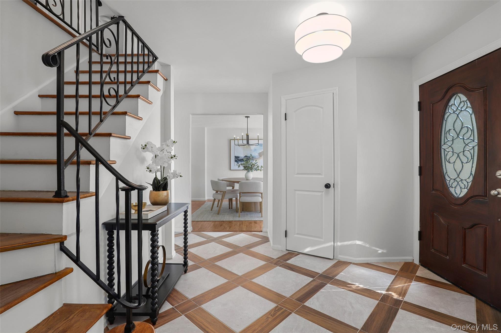 63 Underhill Road Scarsdale, NY 10583 - Photo 5 of 36 Entryway showing views of the dining room
