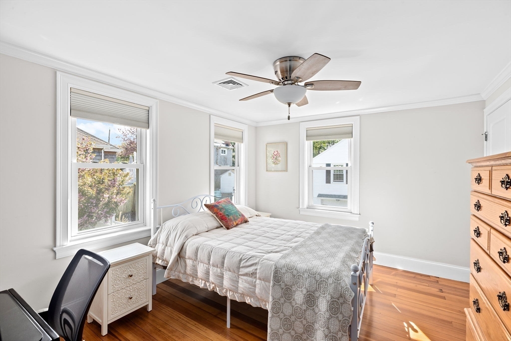 19 Damon Road Scituate, MA 02066 - Photo 15 of 29 a bedroom with a large bed and a window