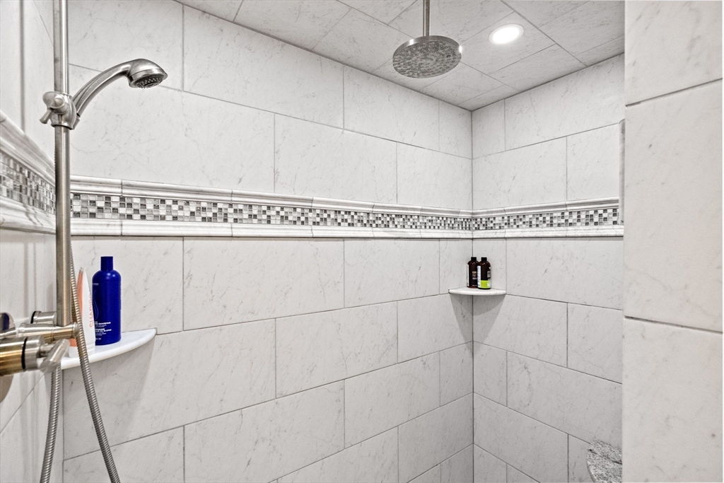 19 Damon Road Scituate, MA 02066 - Photo 22 of 29 a bathroom with a bathtub and a shower