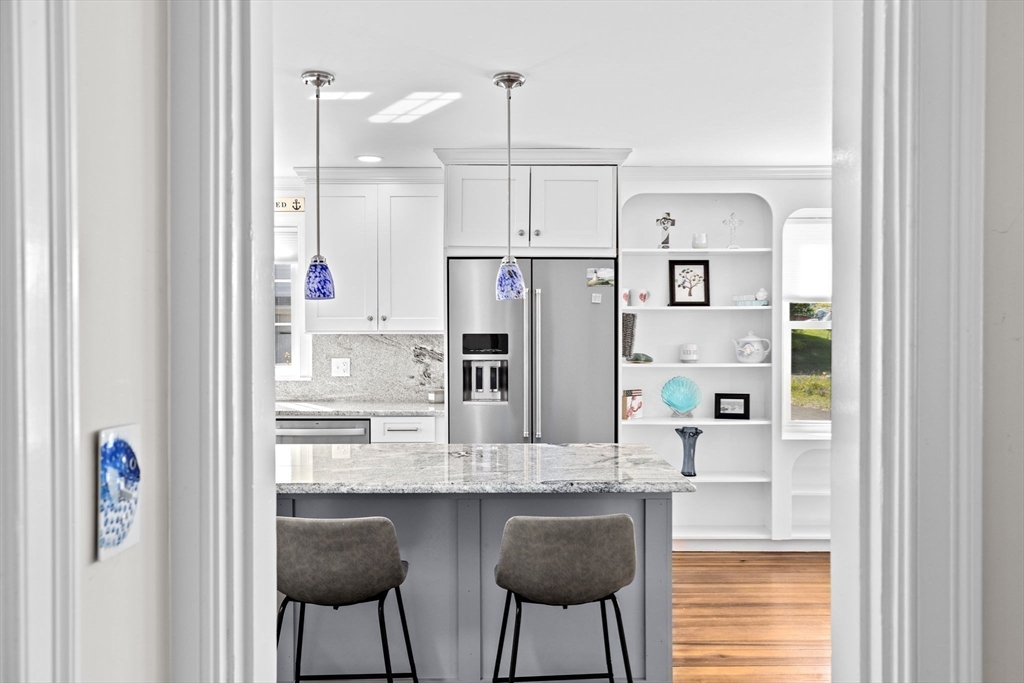 19 Damon Road Scituate, MA 02066 - Photo 10 of 29 a kitchen with refrigerator and cabinets