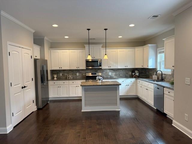 116 Teramont Court Dallas, GA 30132 - Photo 6 of 19 a large kitchen with white cabinets stainless steel appliances