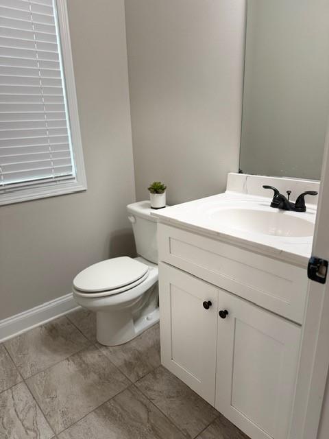 116 Teramont Court Dallas, GA 30132 - Photo 7 of 19 a bathroom with a sink a toilet and a window