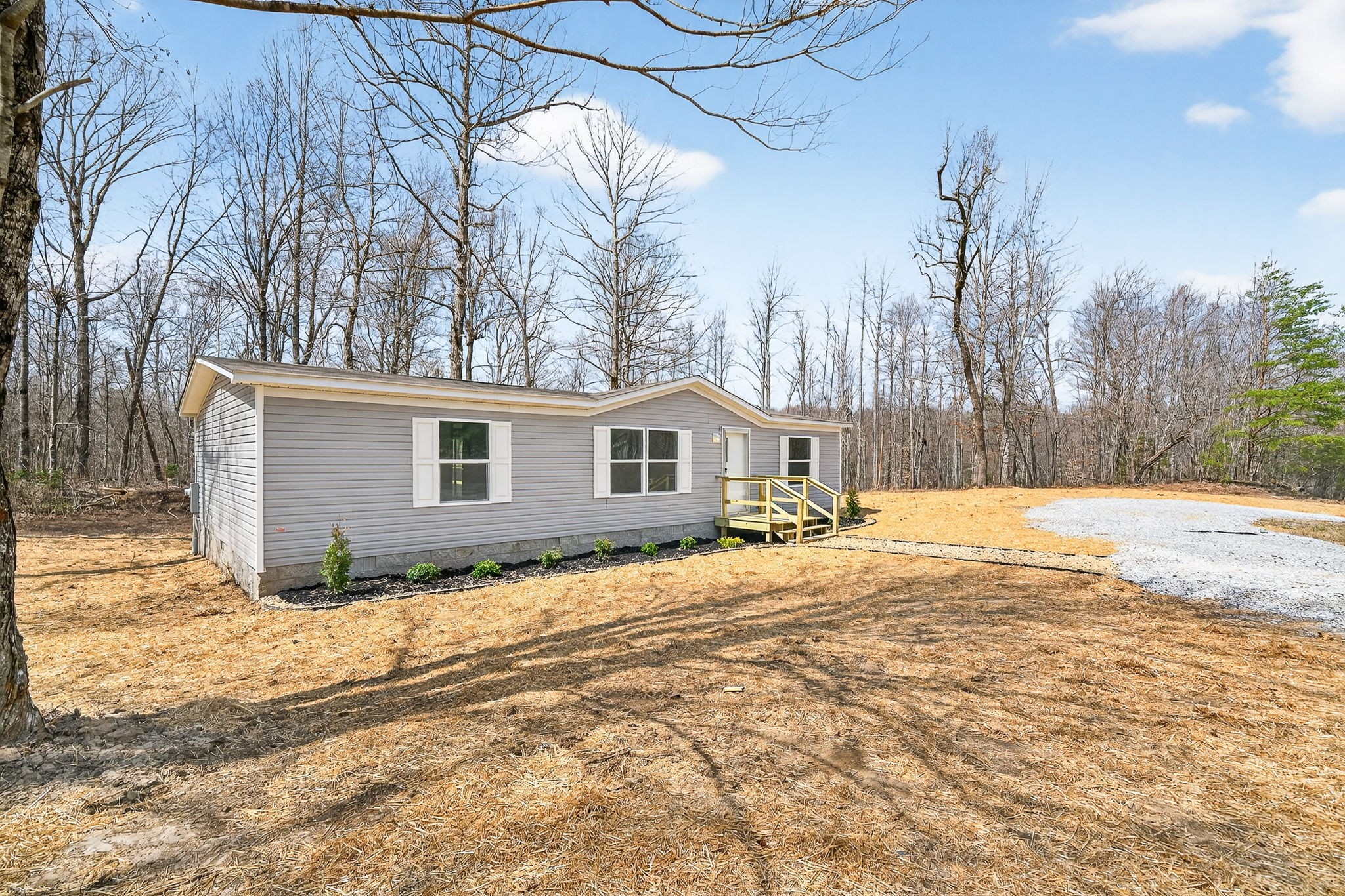428 Maple Branch Road Sparta, TN 38583 - Photo 3 of 28 a view of of house with snow on the road