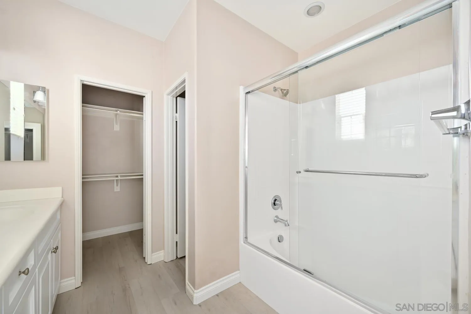 5074 Cascade Way, Unit 102 Oceanside, CA 92057 - Photo 19 of 30 a bathroom with a bathtub and a shower