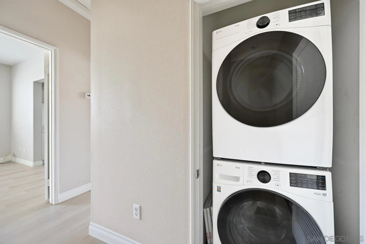 5074 Cascade Way, Unit 102 Oceanside, CA 92057 - Photo 24 of 30 a utility room with dryer and washer