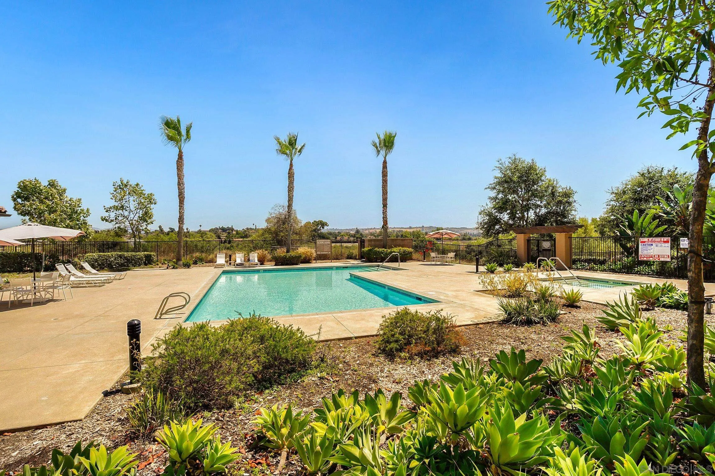 5074 Cascade Way, Unit 102 Oceanside, CA 92057 - Photo 27 of 30 a view of a lake with houses