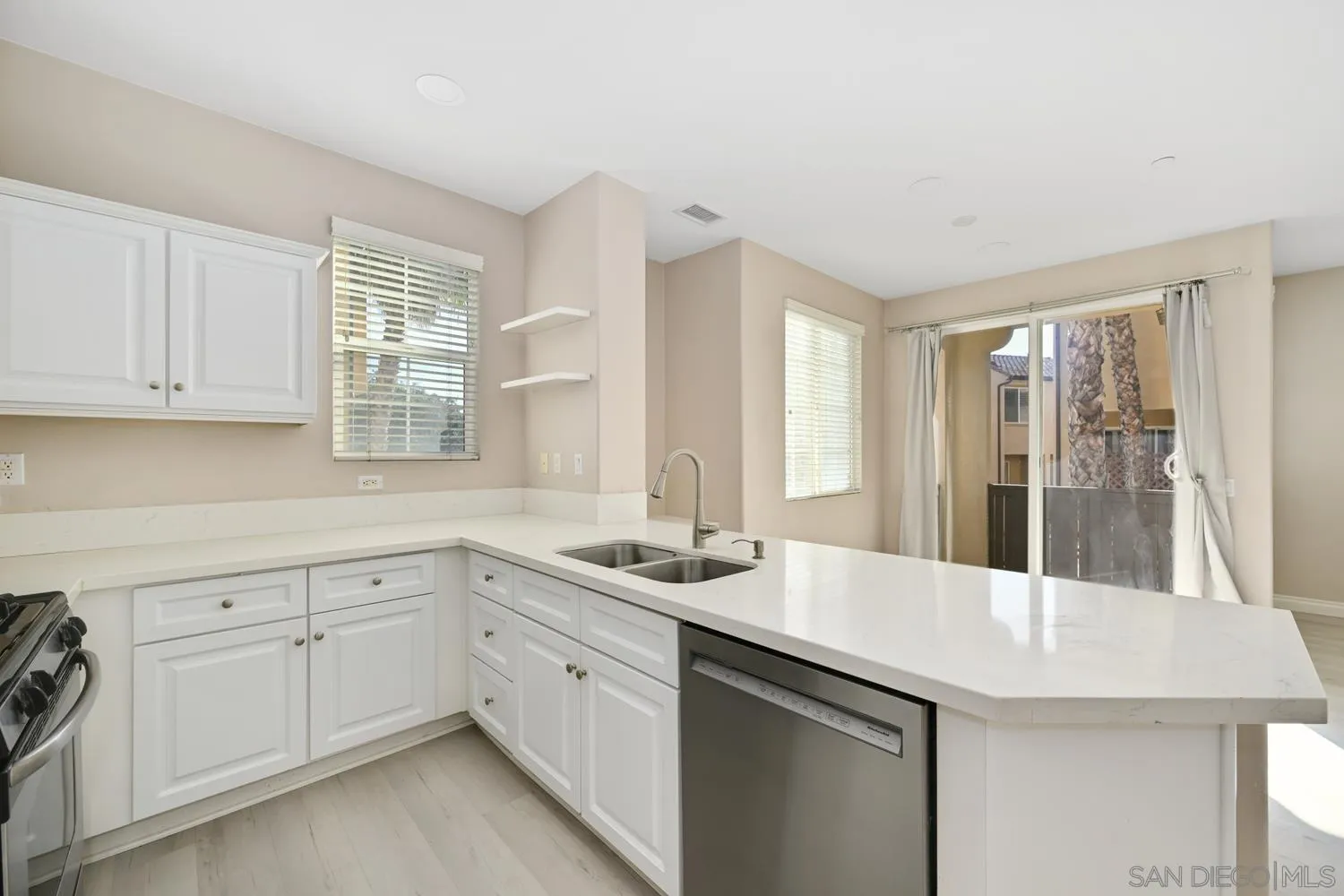 5074 Cascade Way, Unit 102 Oceanside, CA 92057 - Photo 9 of 30 a kitchen with sink and window