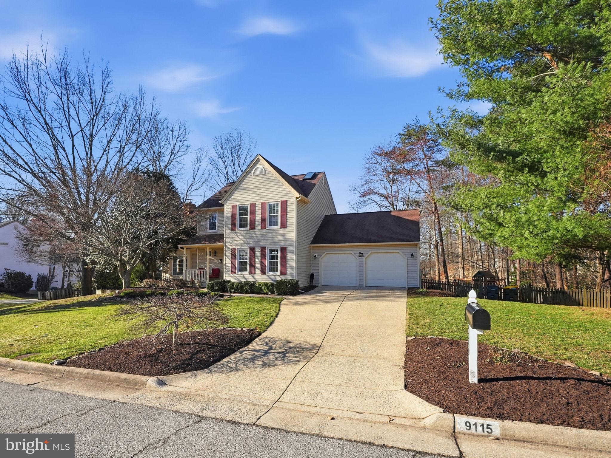 9115 Northedge Drive Springfield, VA 22153 - Photo 1 of 55 a front view of a house with garden