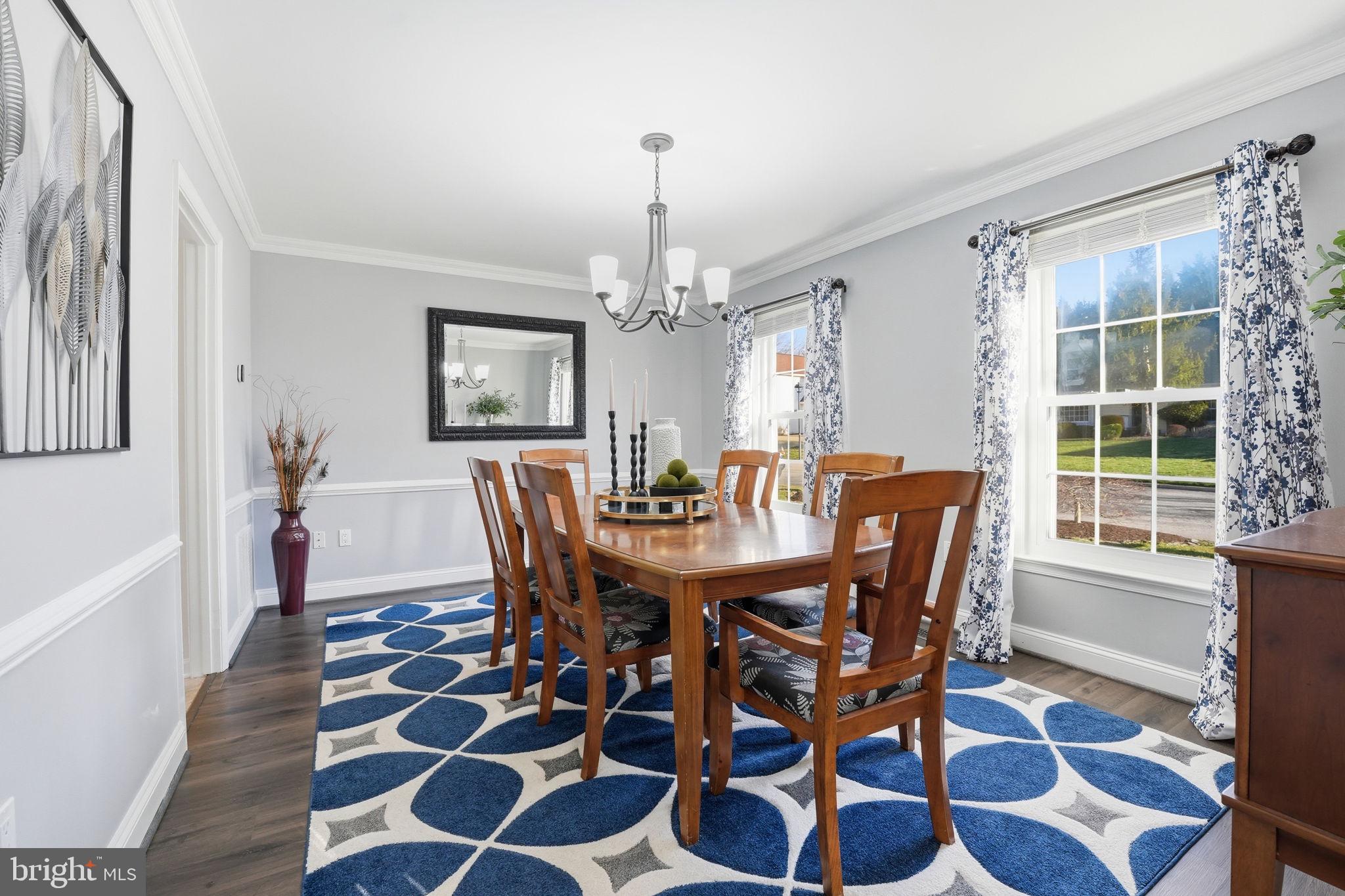 9115 Northedge Drive Springfield, VA 22153 - Photo 18 of 55 a view of a dining room with furniture and chandelier