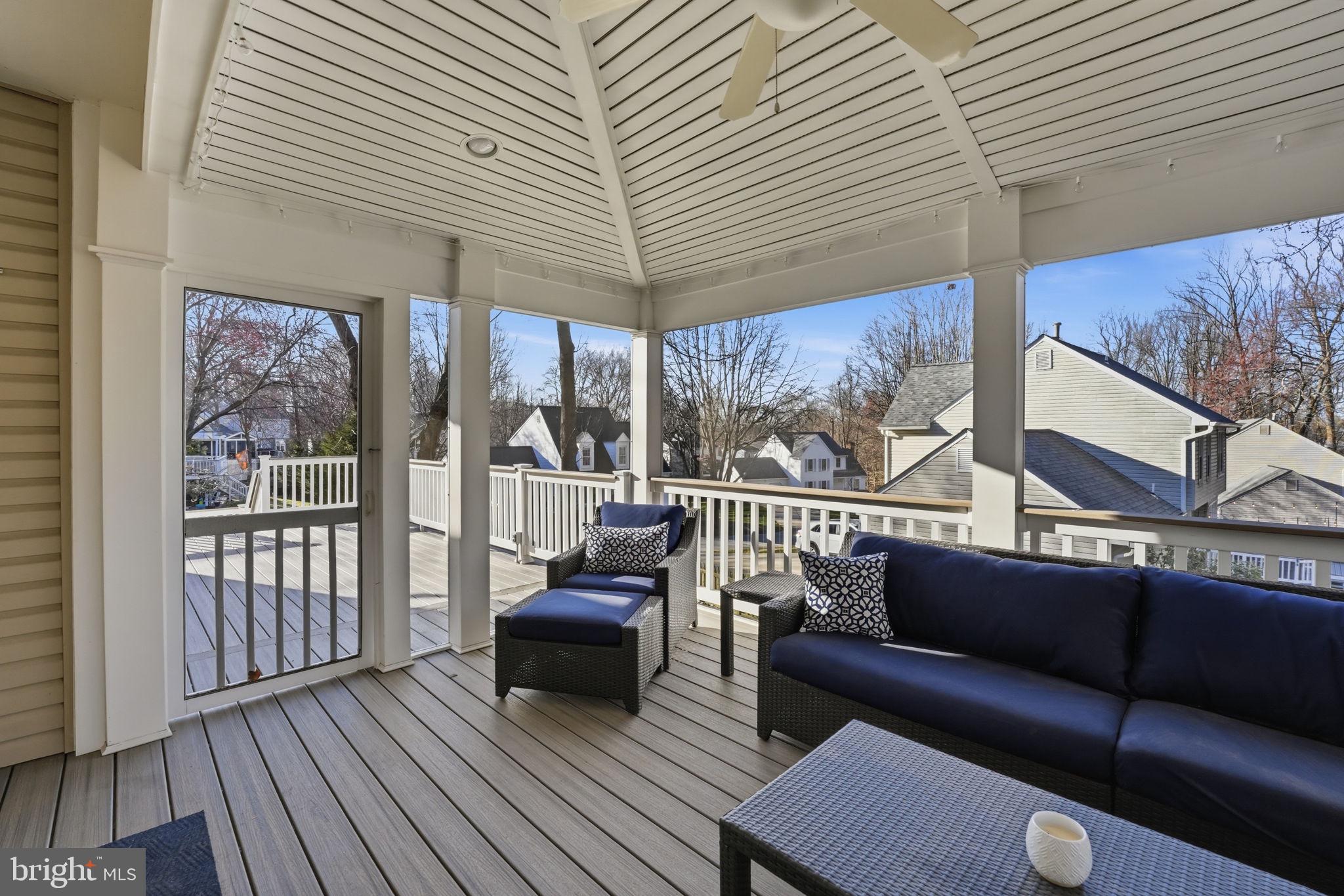 9115 Northedge Drive Springfield, VA 22153 - Photo 29 of 55 a balcony with furniture and wooden floor