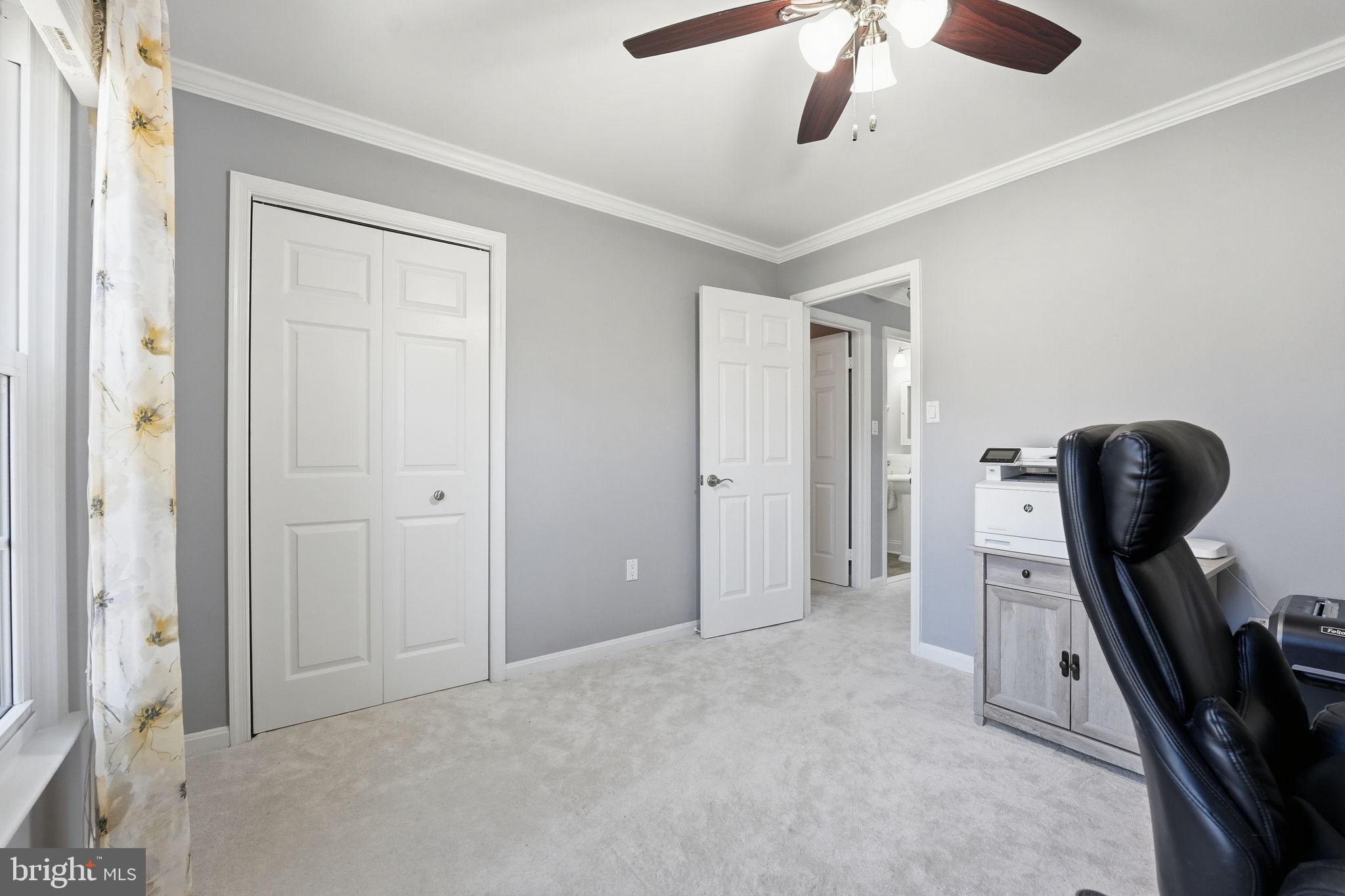 9115 Northedge Drive Springfield, VA 22153 - Photo 32 of 55 a view of a workspace with furniture and a window