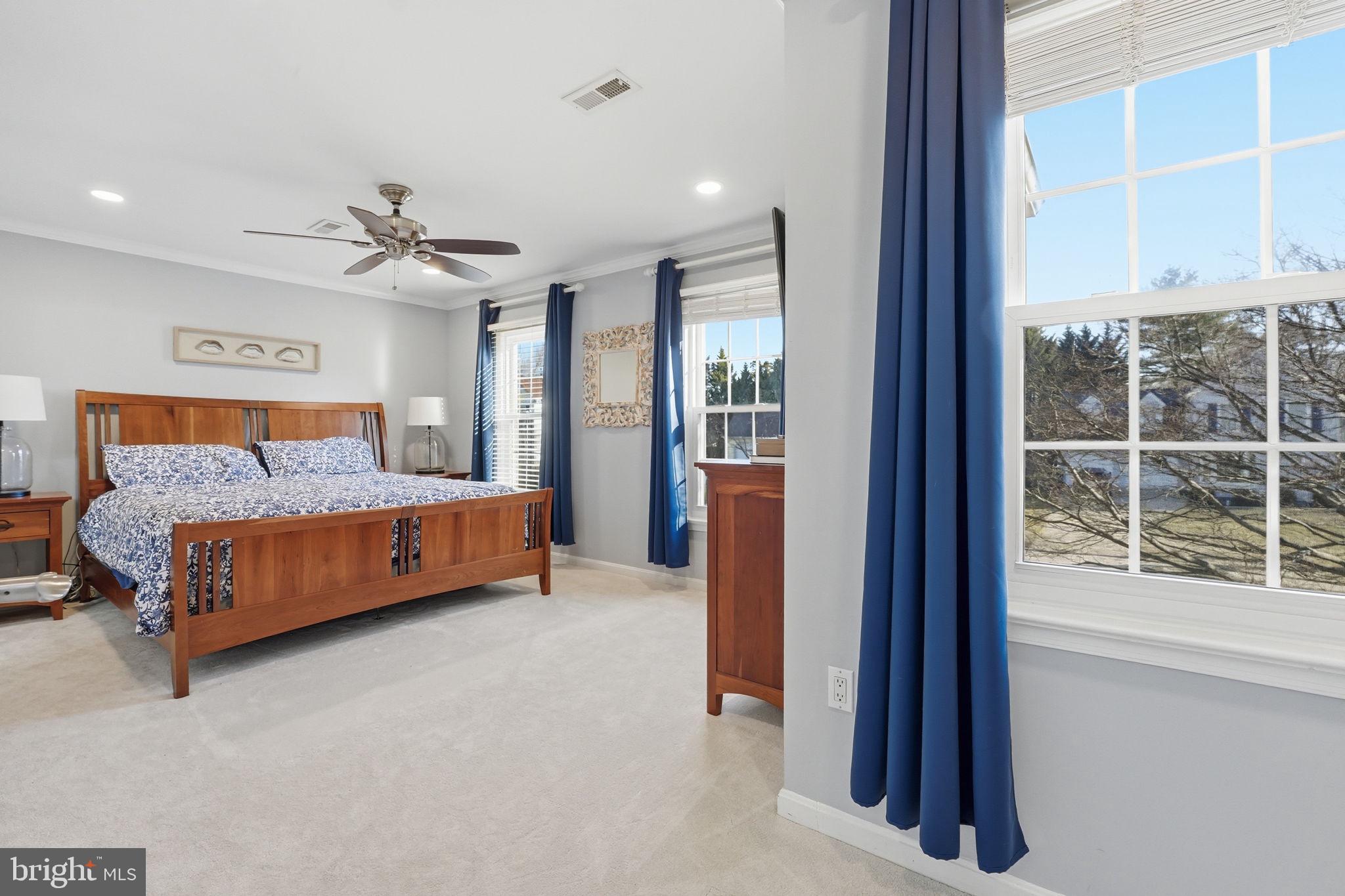 9115 Northedge Drive Springfield, VA 22153 - Photo 37 of 55 a spacious bedroom with a bed and a window