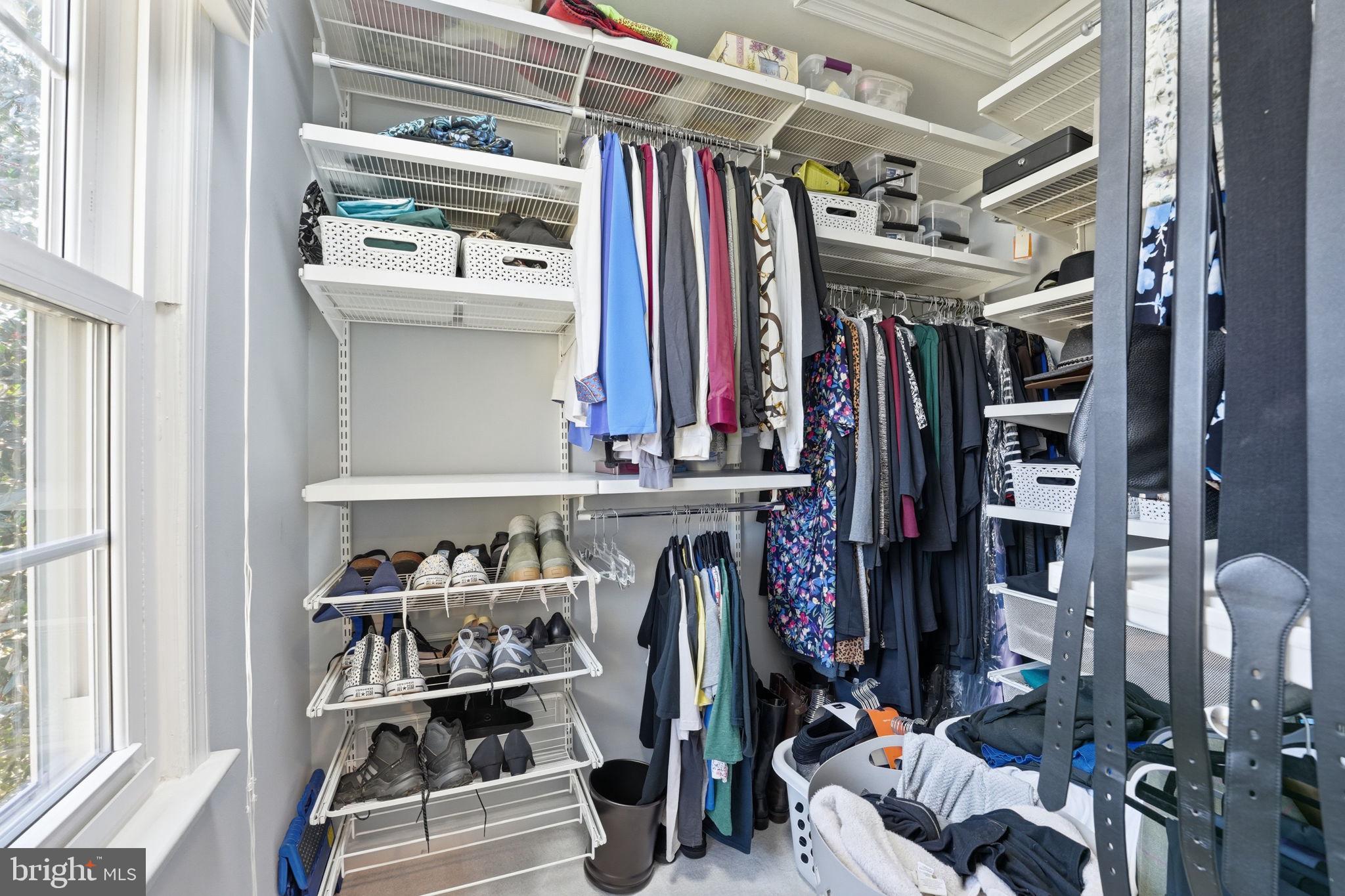 9115 Northedge Drive Springfield, VA 22153 - Photo 39 of 55 a view of walk in closet with clothes and shoes