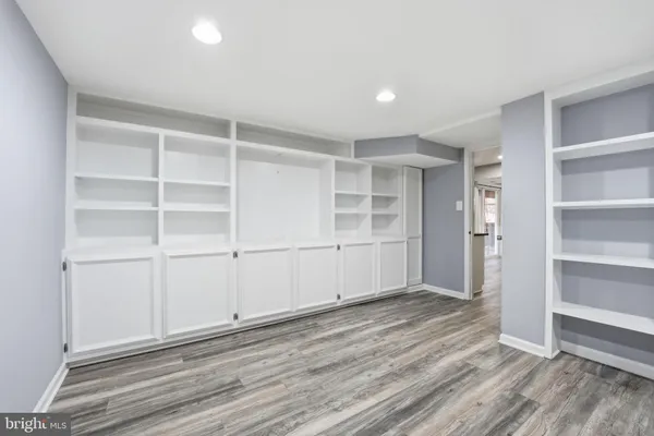 a picture of a book and a view of a book in a white and white wall