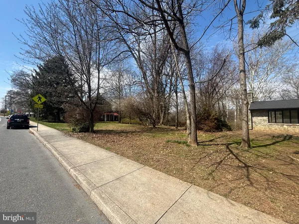 a view of a street with a building