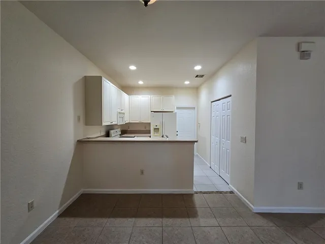 a view of kitchen and center island