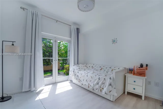 a spacious bathroom with a double vanity sink mirror and toilet