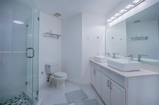 a view of an empty room with glass door