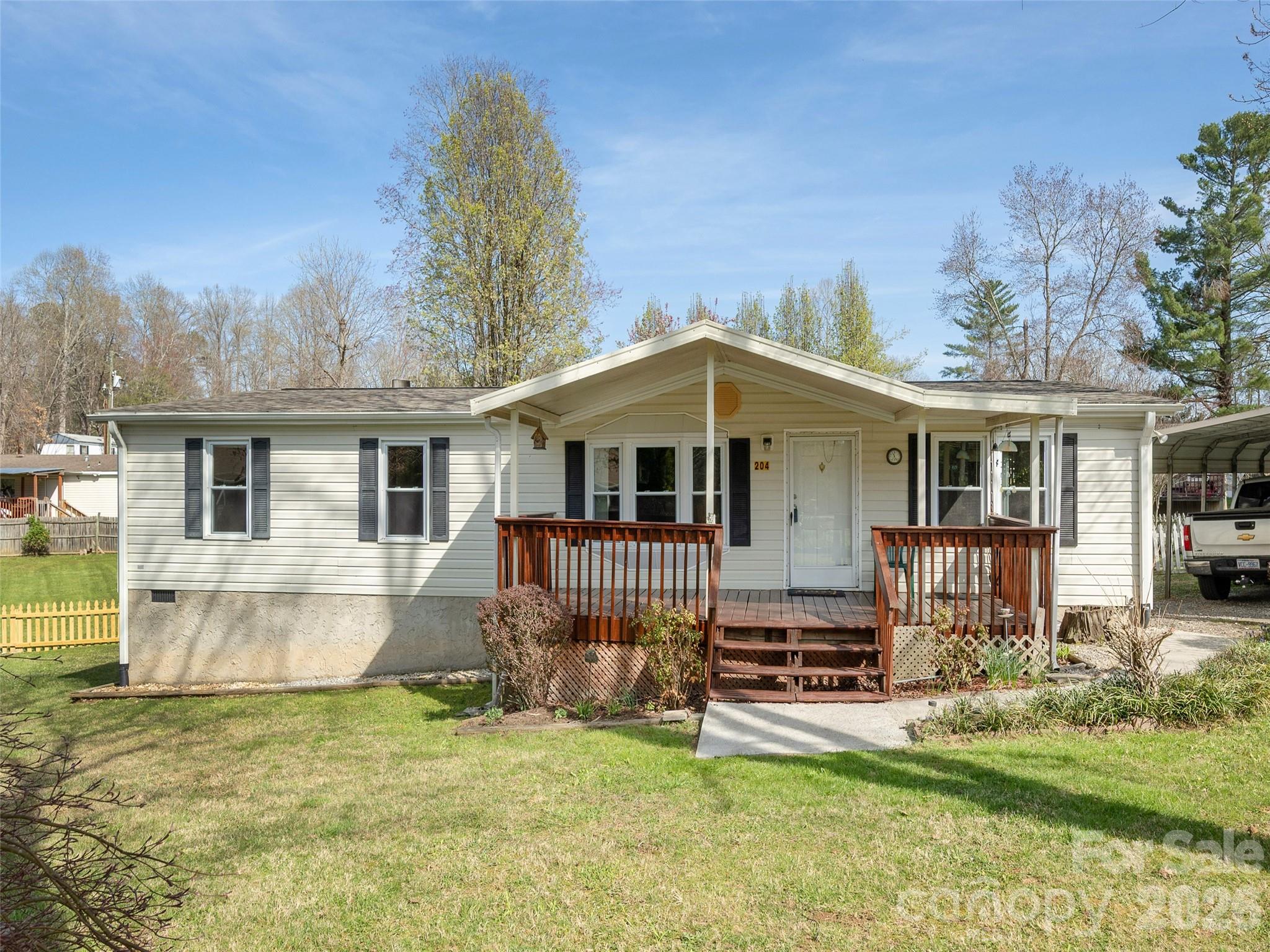 204 Cookies Way Arden, NC 28704 - Photo 1 of 22 front view of a house with a yard