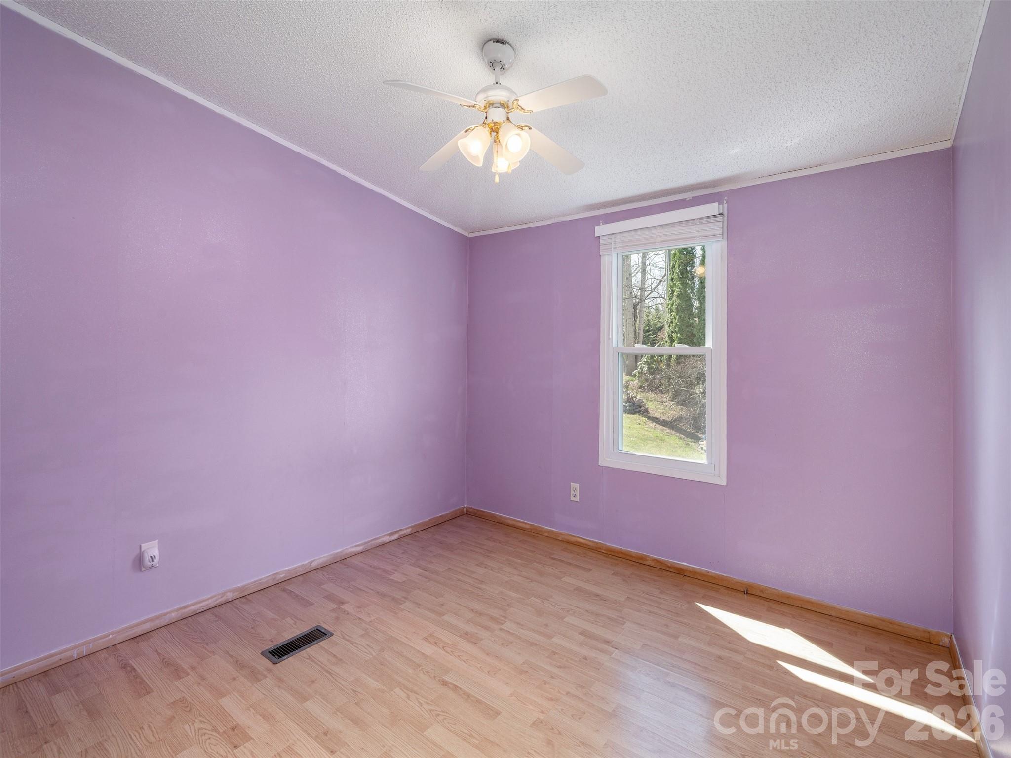 204 Cookies Way Arden, NC 28704 - Photo 14 of 22 a view of a room with a window