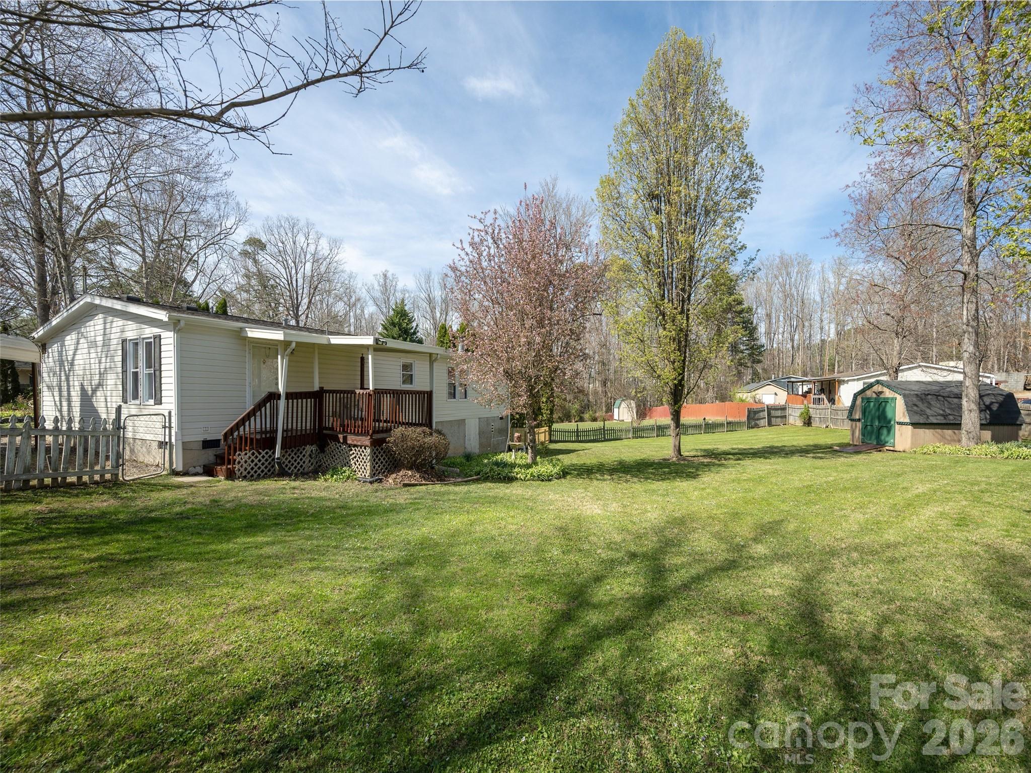 204 Cookies Way Arden, NC 28704 - Photo 17 of 22 a view of a house with a backyard