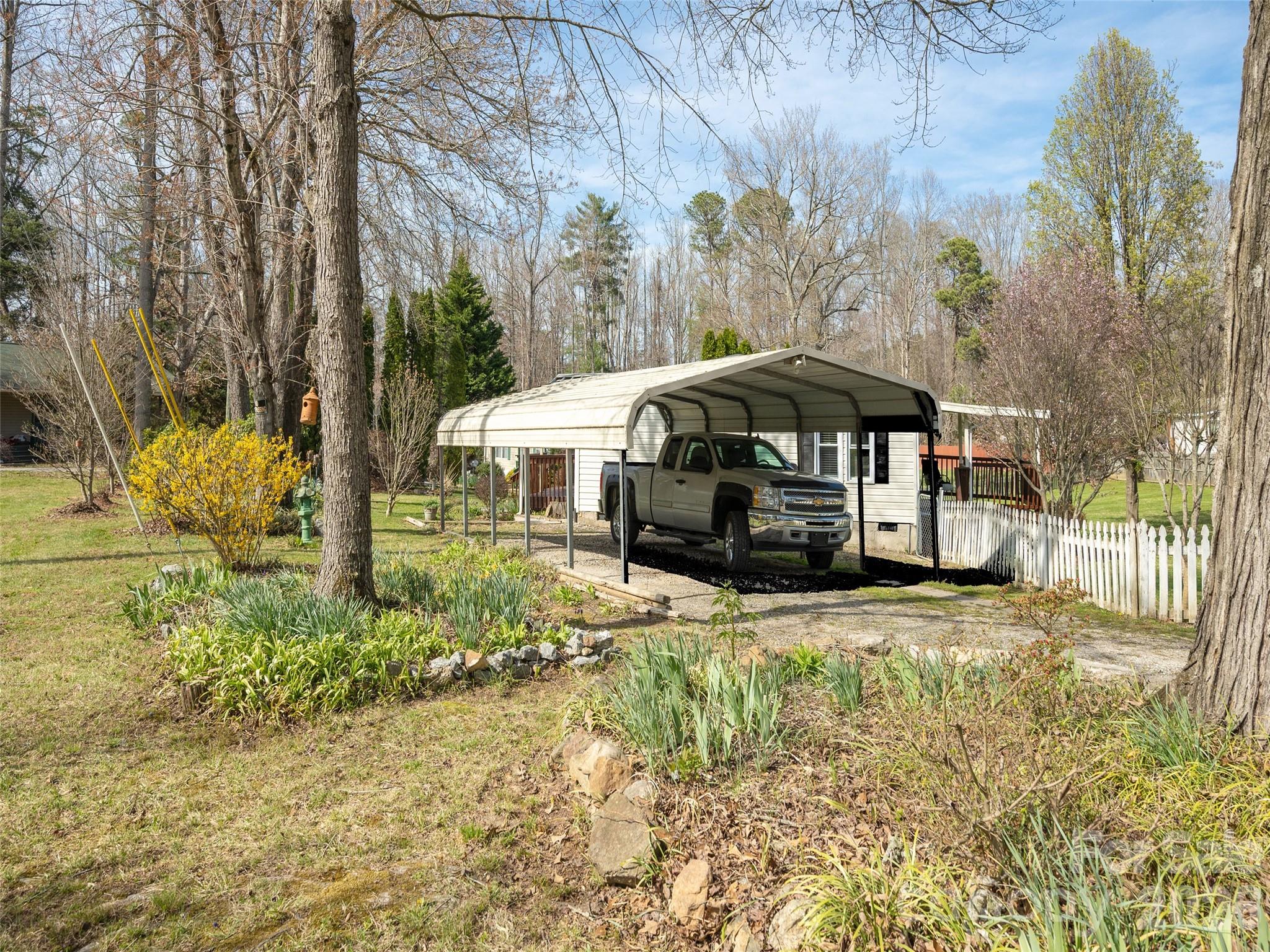 204 Cookies Way Arden, NC 28704 - Photo 22 of 22 a view of a house with backyard and sitting area