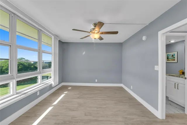 a parked cars parked in front of a building