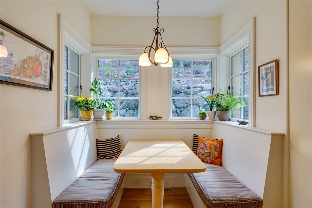 7 Wolcott Road Winchester, MA 01890 - Photo 15 of 41 a view of a dining room with furniture window and wooden floor