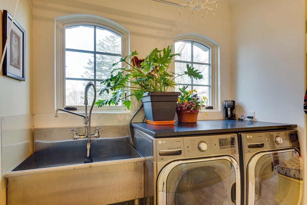 7 Wolcott Road Winchester, MA 01890 - Photo 23 of 41 a view of a sink and a window in a kitchen