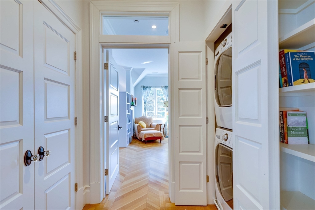 7 Wolcott Road Winchester, MA 01890 - Photo 29 of 41 a view of a hallway view with living room and furniture