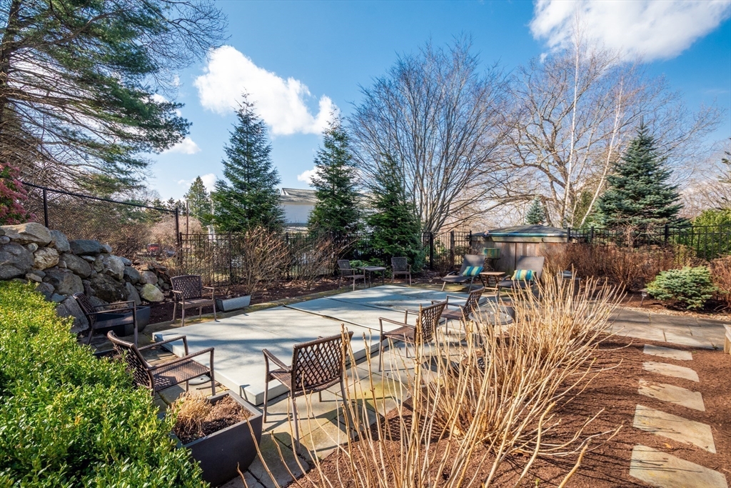 7 Wolcott Road Winchester, MA 01890 - Photo 34 of 41 a view of a swimming pool with a patio
