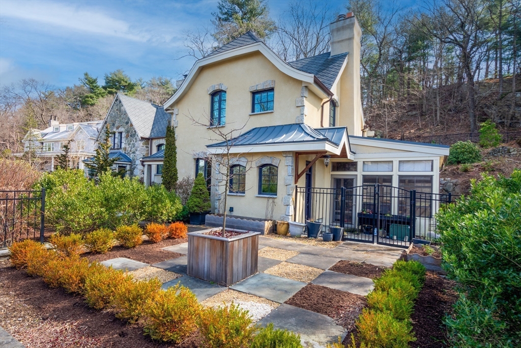 7 Wolcott Road Winchester, MA 01890 - Photo 36 of 41 a front view of a house with a porch