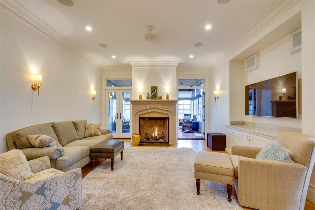 7 Wolcott Road Winchester, MA 01890 - Photo 6 of 41 a living room with furniture and a fireplace