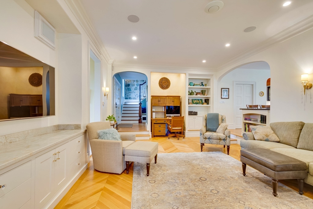 7 Wolcott Road Winchester, MA 01890 - Photo 10 of 41 a living room with furniture and a large window