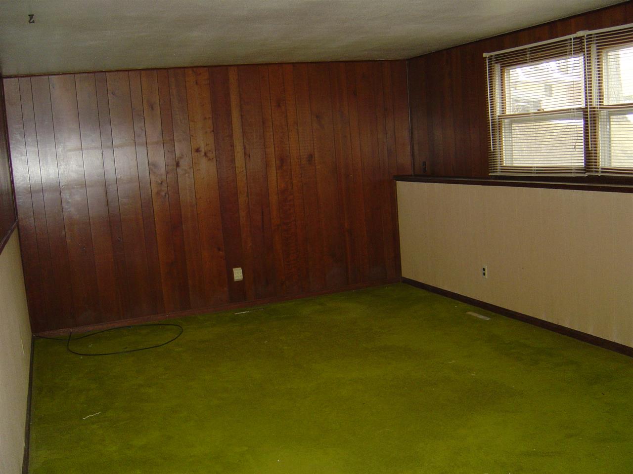 4940 Welsh Road Rockford, IL 61107 - Photo 11 of 12 an empty room with windows