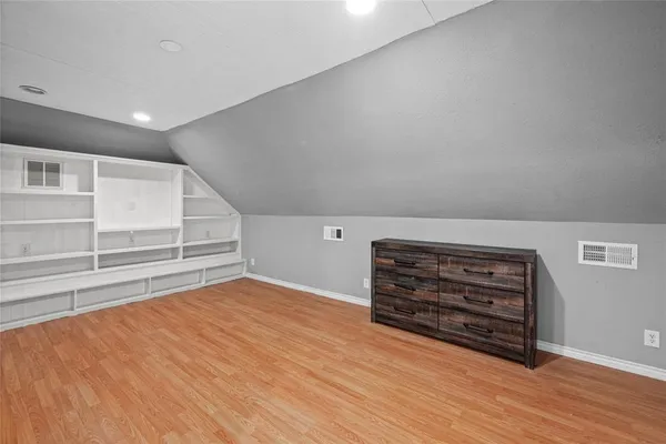 a view of room and wooden floor