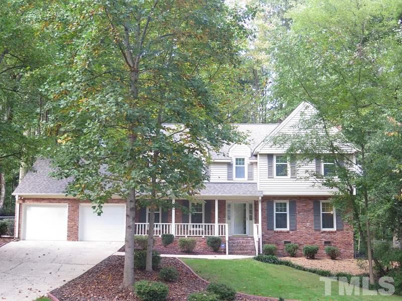 1317 Ravenhurst Drive Raleigh, NC 27615 - Photo 1 of 23 a front view of a house with garden