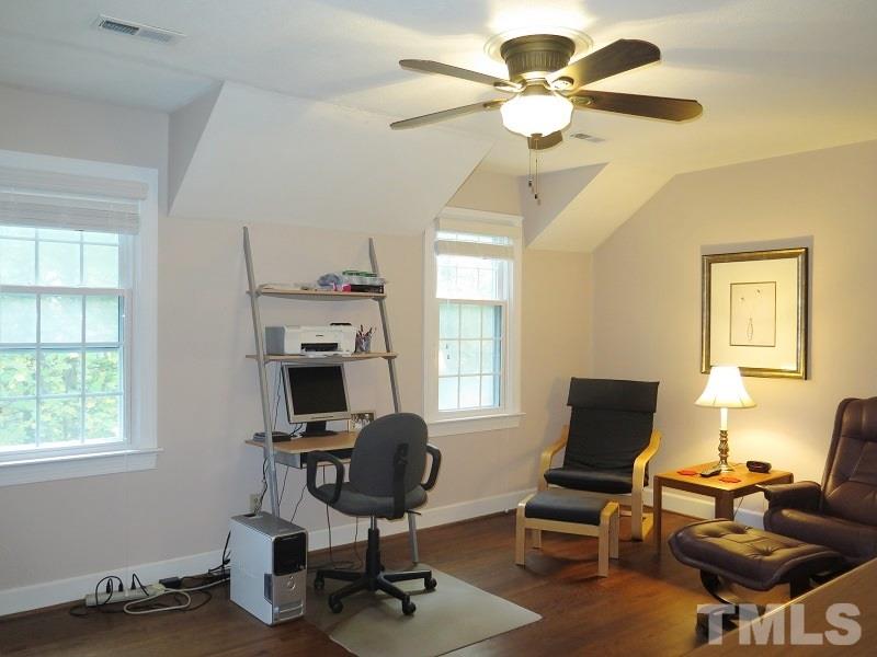 1317 Ravenhurst Drive Raleigh, NC 27615 - Photo 14 of 23 a view of a workspace with furniture and a window