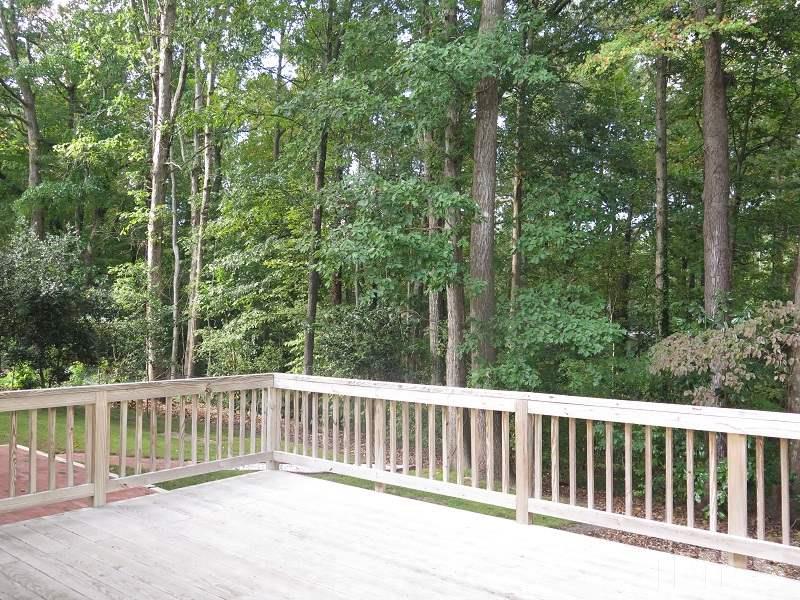 1317 Ravenhurst Drive Raleigh, NC 27615 - Photo 19 of 23 a view of a wooden fence